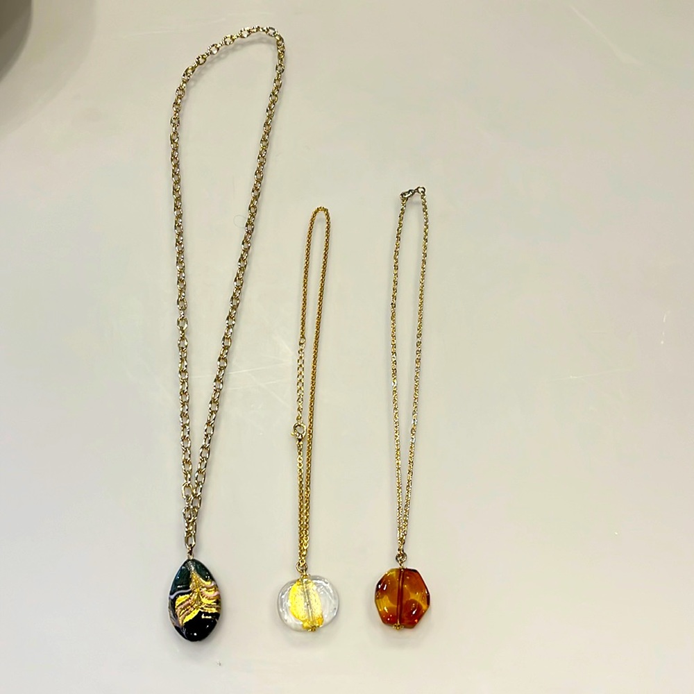Gold plated necklaces. Blown glass pendants. Never worn.